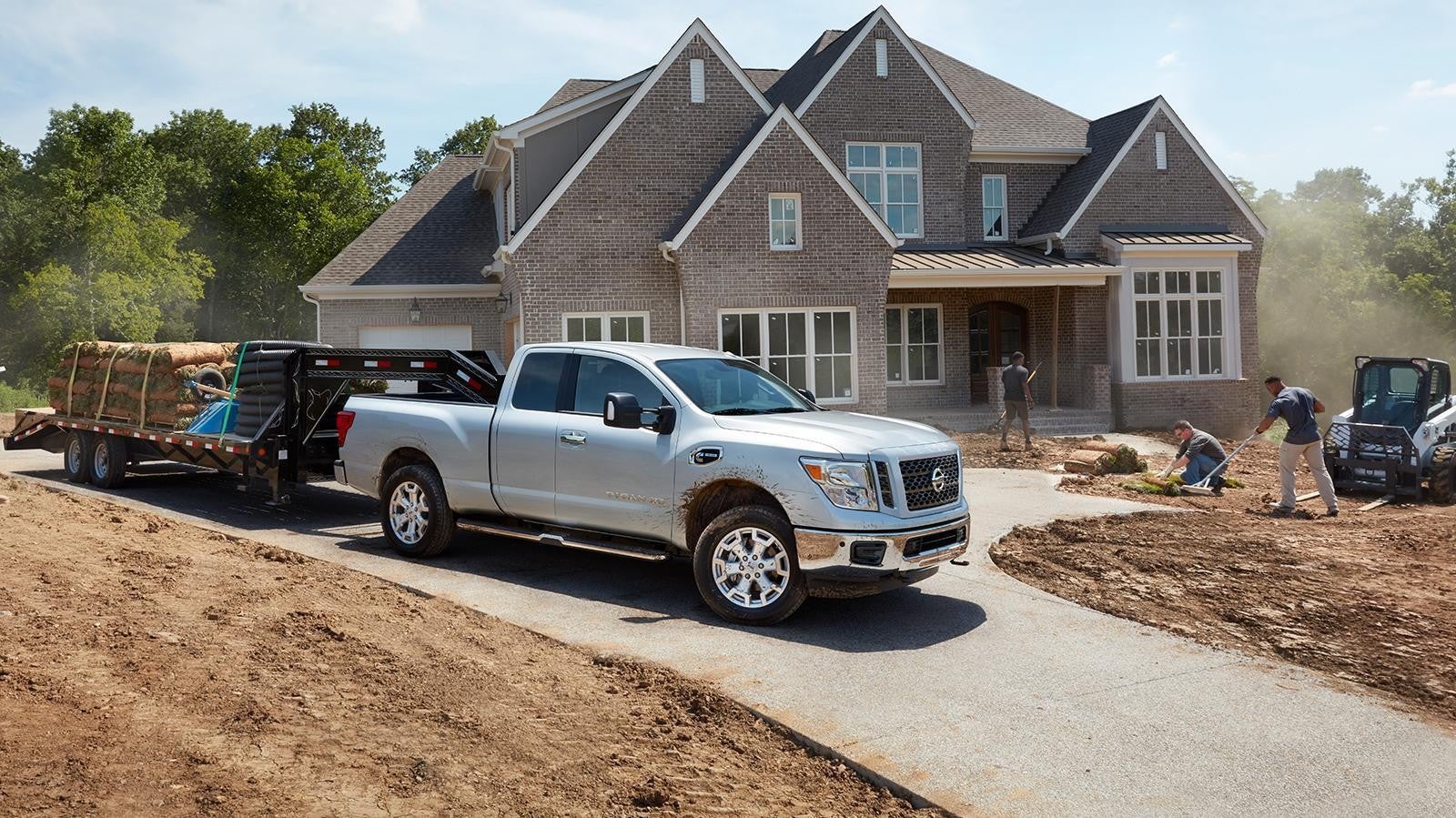 Nissan of Lexington Park in California MD collection of all the Nissan commercial trucks at a job site