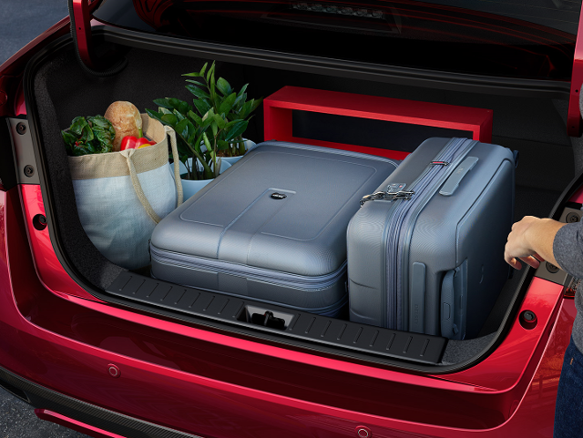 Nissan of Lexington Park in California MD Nissan Versa trunk open and full of luggage and groceries
