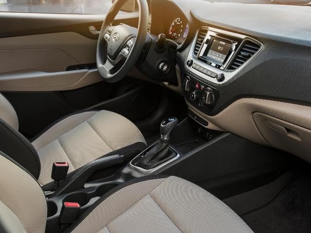 Nissan of Lexington Park in California MD Hyundai Accent front seats in tan material and steering wheel